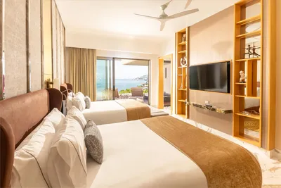 Two-bedroom Junior Suite at Garza Blanca Sanctuary with ocean views, contemporary décor and a private terrace in Puerto Vallarta.
