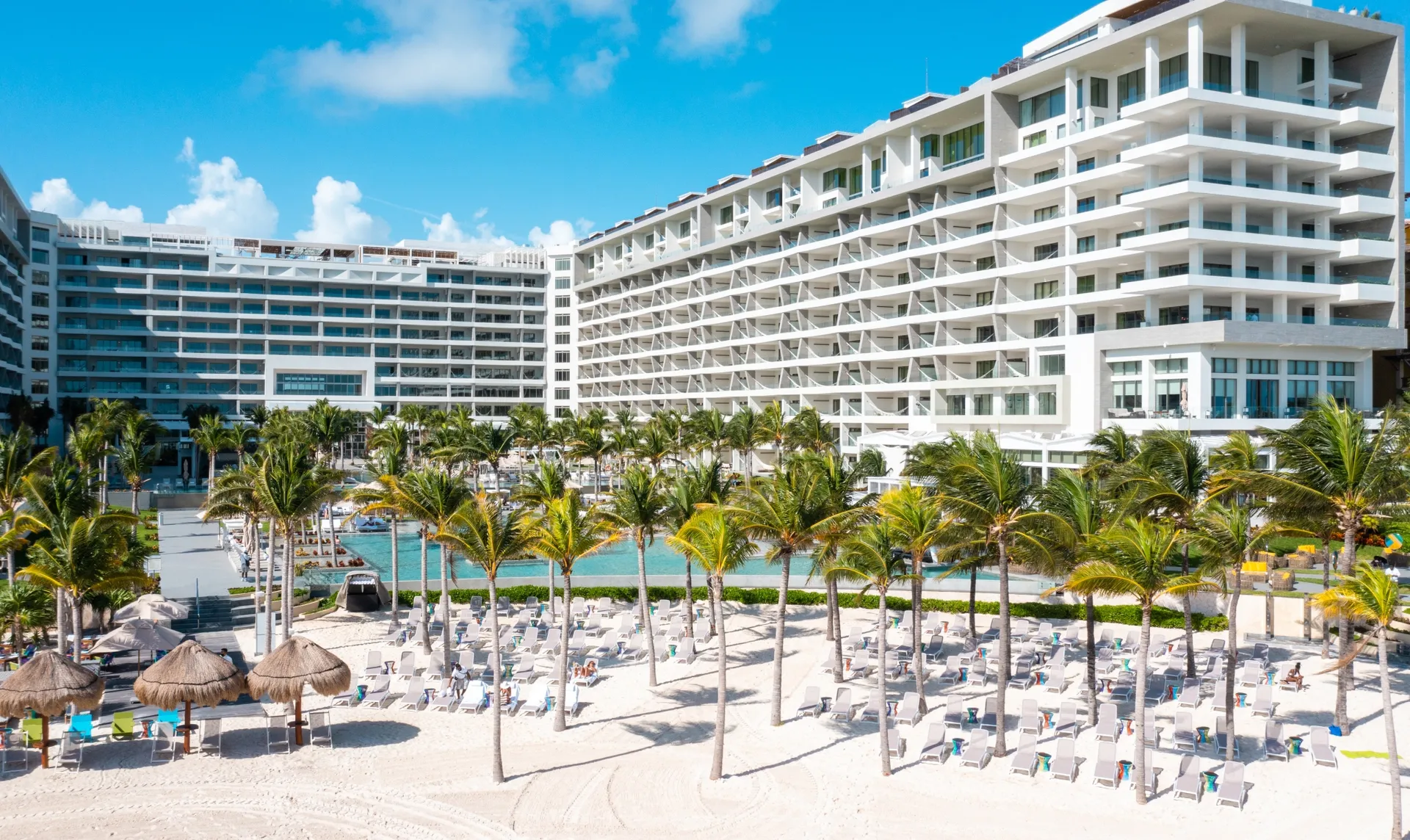 front view of garza blanca cancun beach pools and property