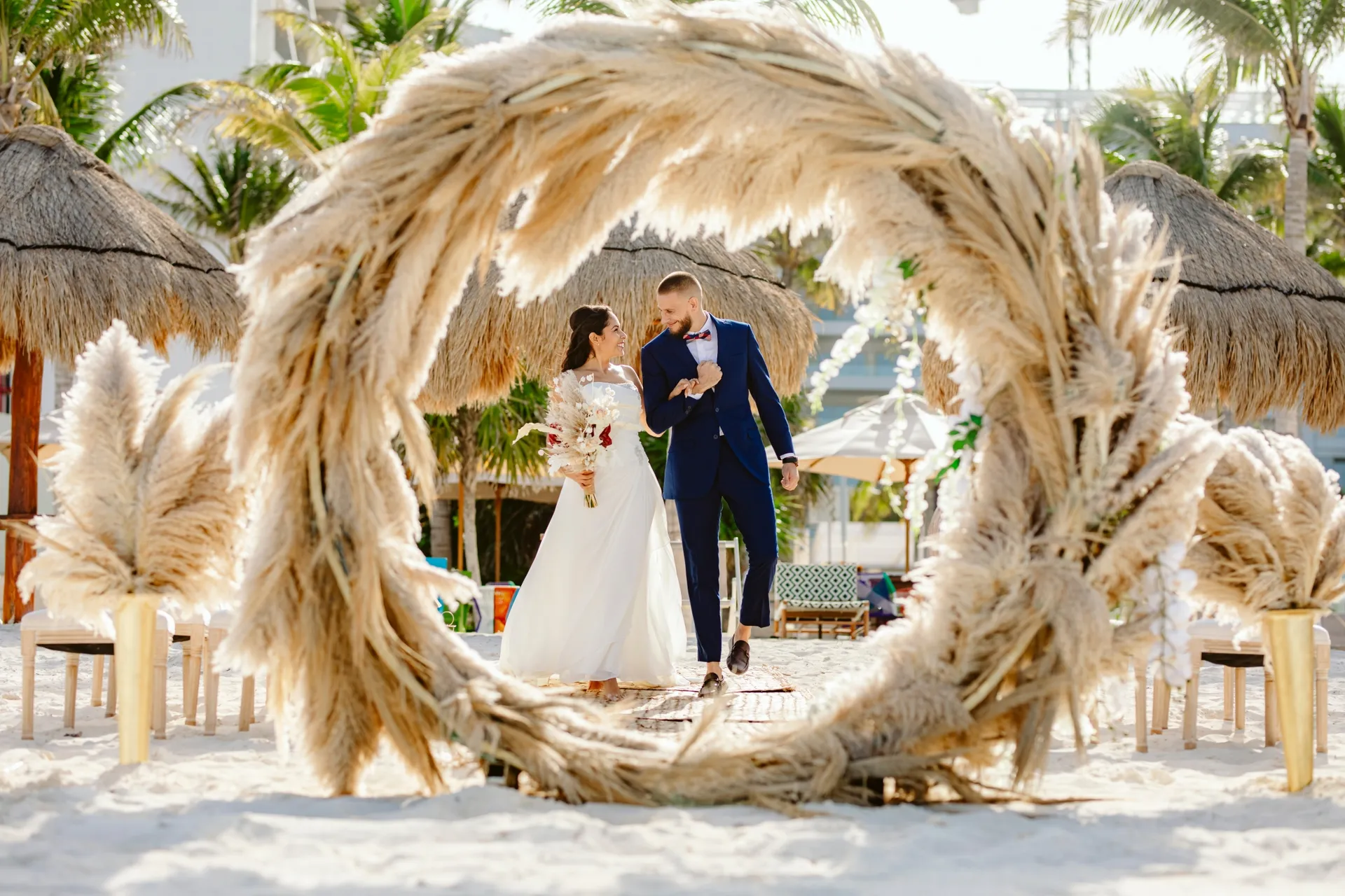 beach wedding ceremony at garza blanca cancun