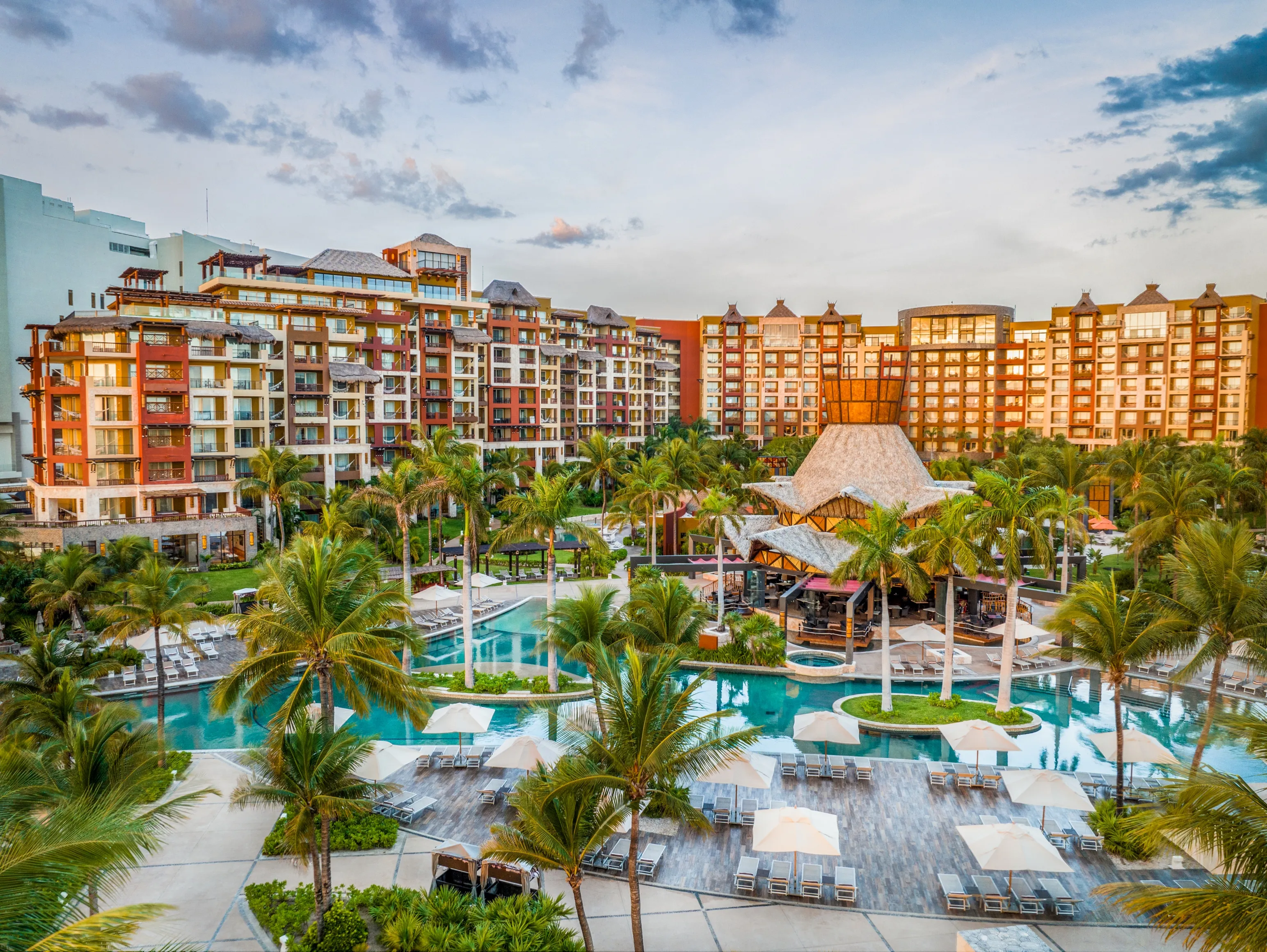 aerial-front-view-of-villa-del-palmar-cancun-property-during-sunrise