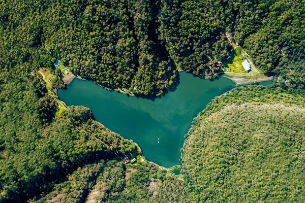 Sierra Lago Resort & Spa - Aerial view of the lake surrounded by dense forest in the Sierra of Mascota
