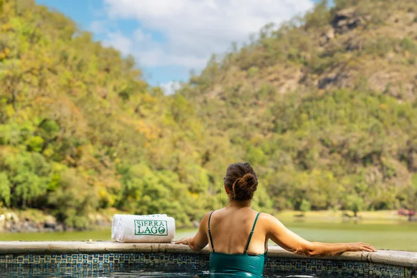 Sierra Lago Resort & Spa - Vertical view of a woman in the jacuzzi looking at the mountains