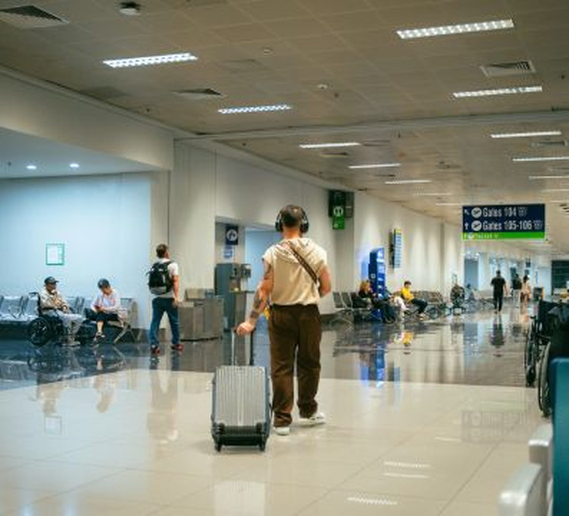 walking through the airport aile