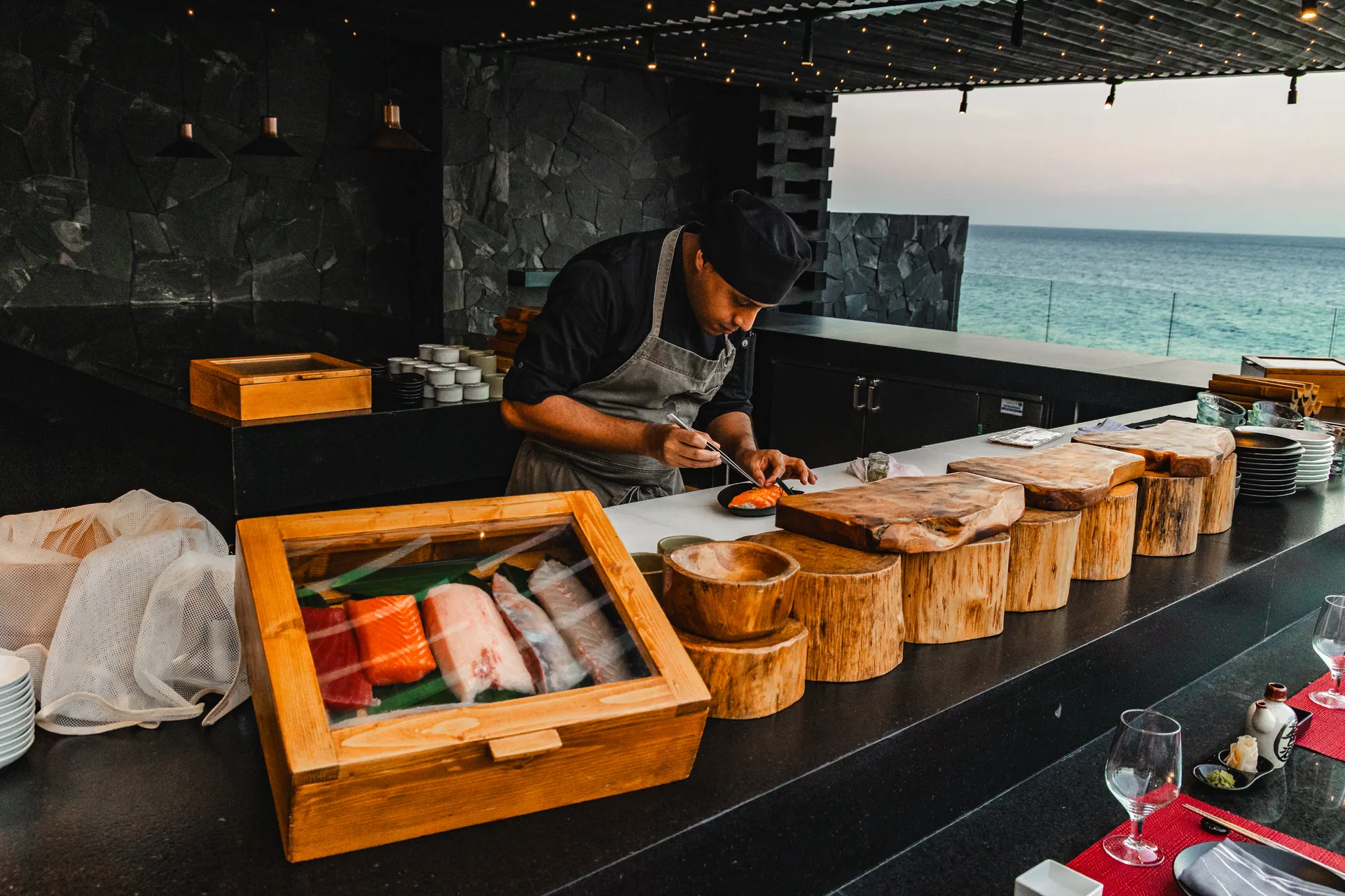 Chef preparing an Omakase course at Hiroshi