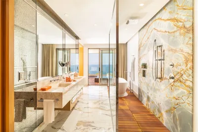 Junior Suite at Garza Blanca Sanctuary with a king bed, ocean views and a private terrace in Puerto Vallarta.