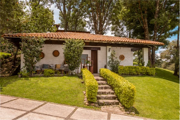 Sierra Lago Resort & Spa - White spa building with a tiled roof and gardens