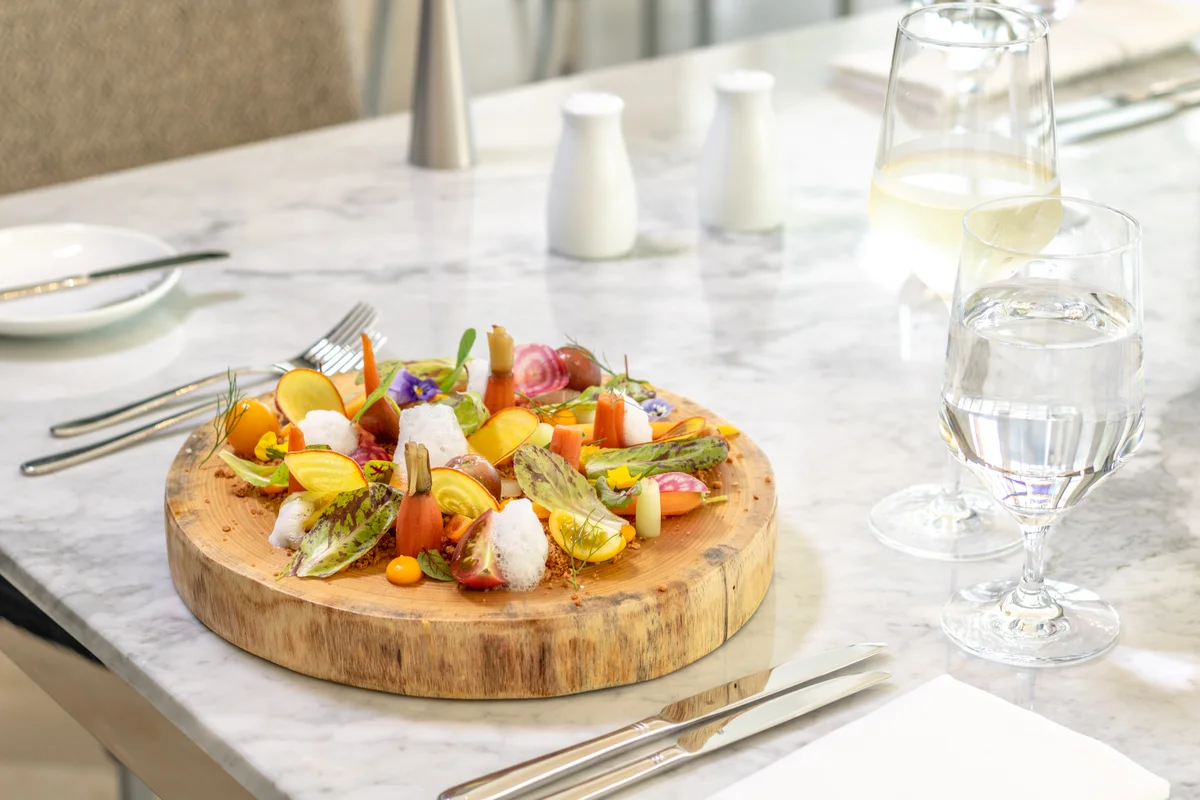 Seafood dish served on a wooden board at Blanca Blue, Garza Blanca Los Cabos