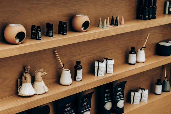 Garza Blanca spa shelf with essential oils, ceramic diffusers, reed sticks, artisanal soaps and wellness gifts — Escape to the Extraordinary