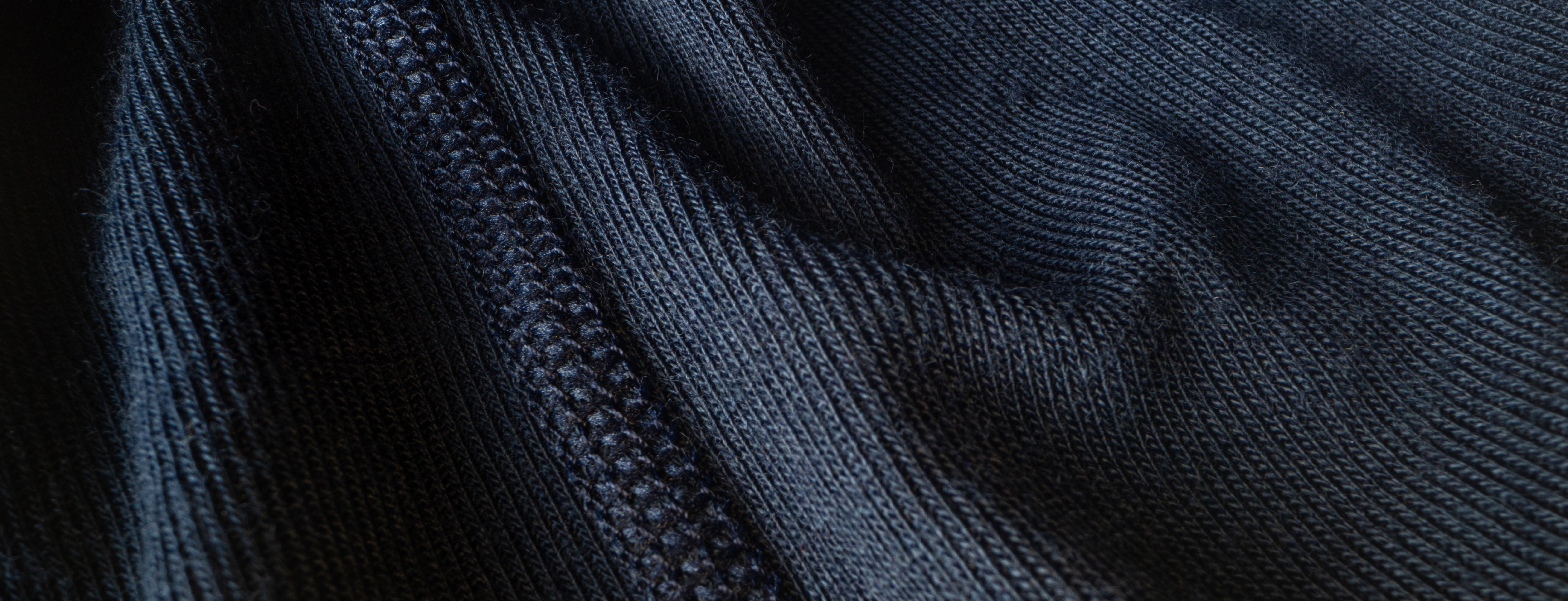Close up picture of navy colored wool fabric