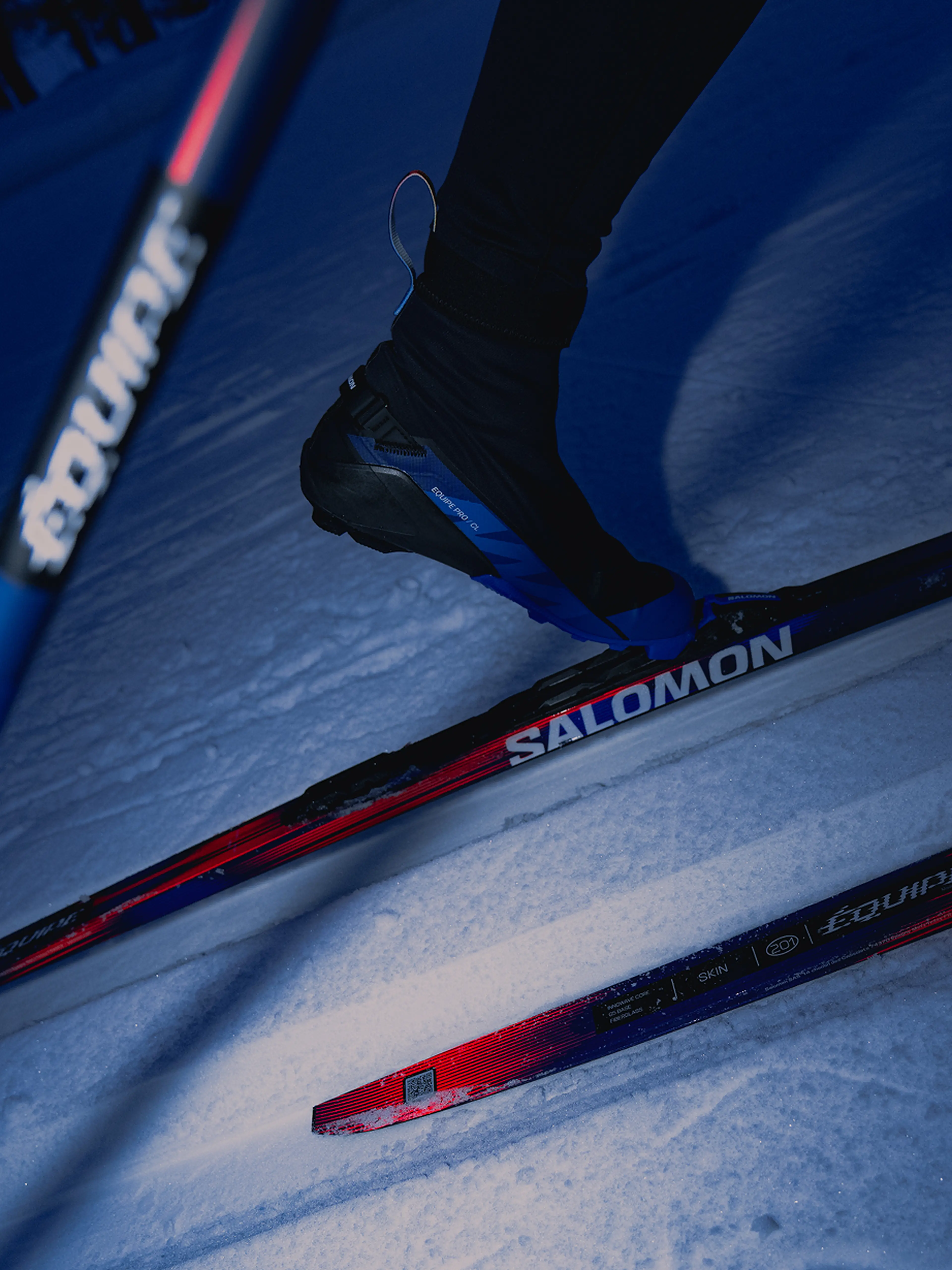Close up picture of XC skis and boots in motion