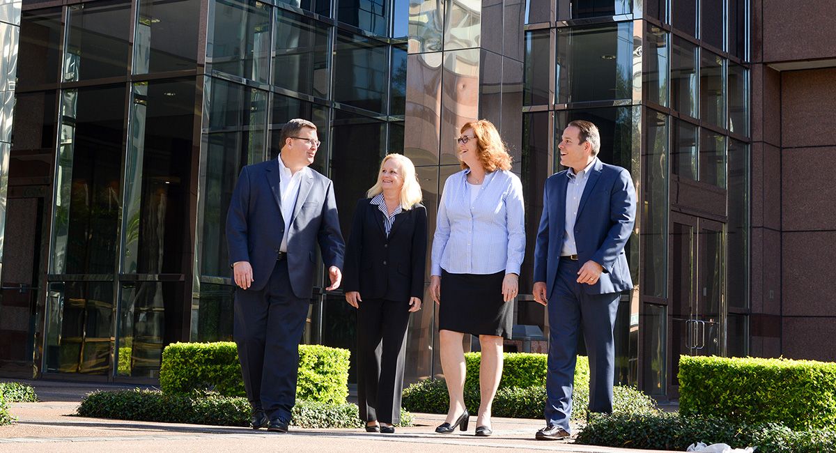 The four founding partners of BMWL: Mike Batts, Kim Morrison, Michele Wales, & Mike Lee