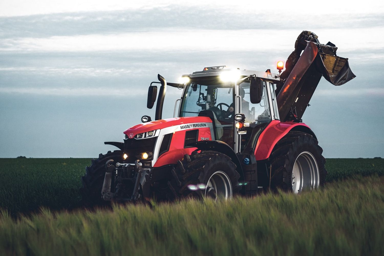 MF 7S 210 WITH DISK MOWER EMOTIVE IN FIELD SUNSET BEZU 0521 05