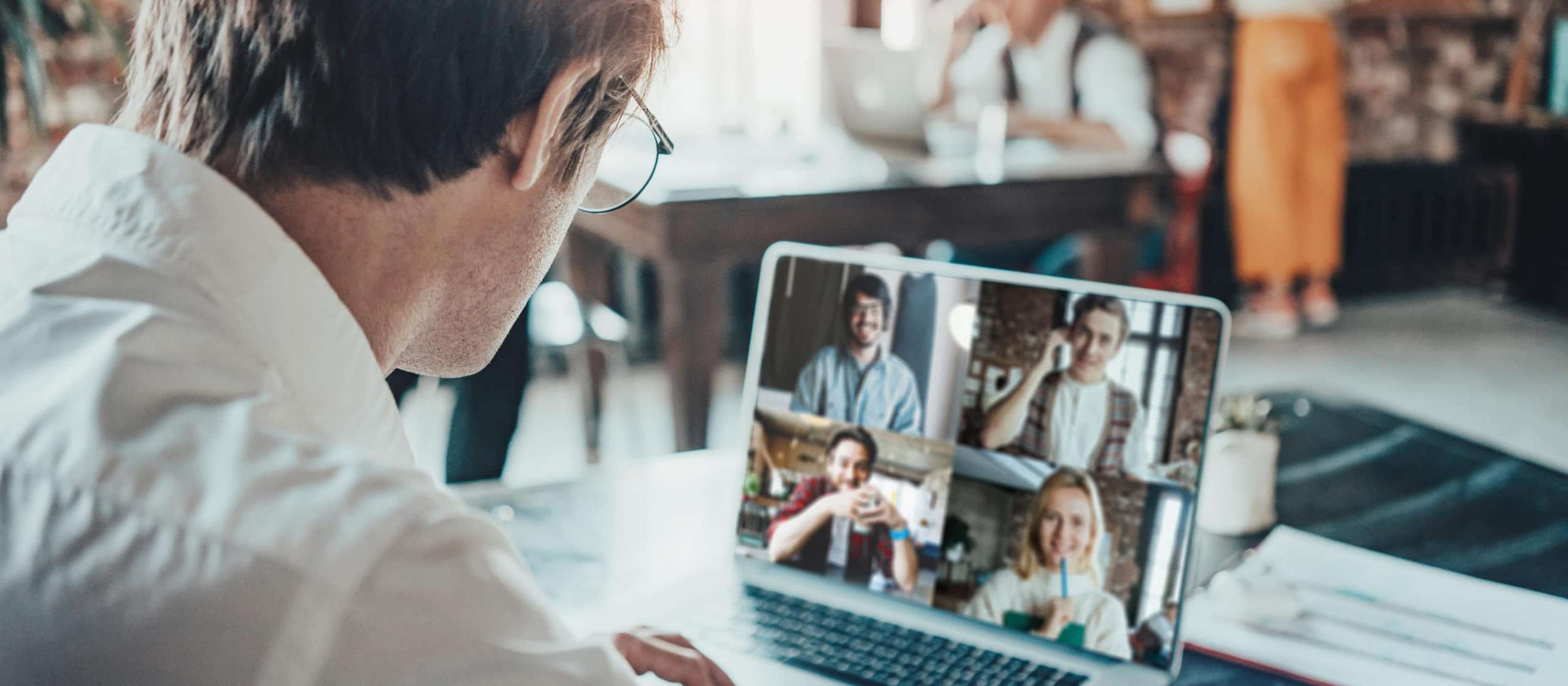 Office Business Team Concept. Video Conference Meeting Using Laptop With Teammates. Wide Screen Orientation