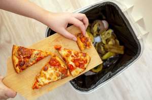 Woman Hands Throwing Food Into The Trash, Bin, Waste Of Food, Food Concept