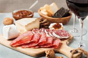 Two Glasses Of Red Wine With Charcuterie Assortment, Beaujolais Concept