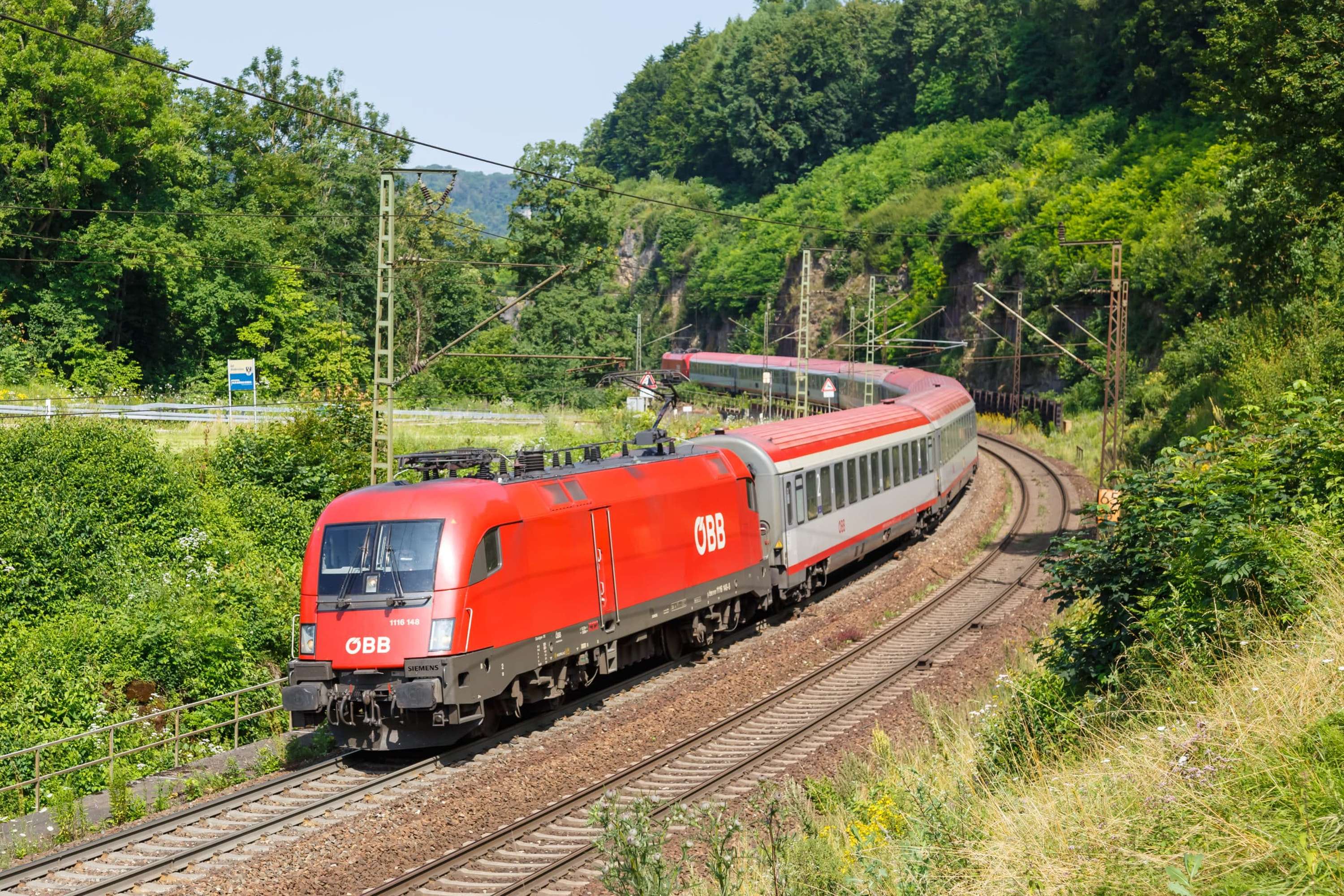 Amstetten, Germany – July 21, 2021: InterCity IC train of ÖBB Österreichische Bundesbahnen on Geislinger Steige near Amstetten, Germany.