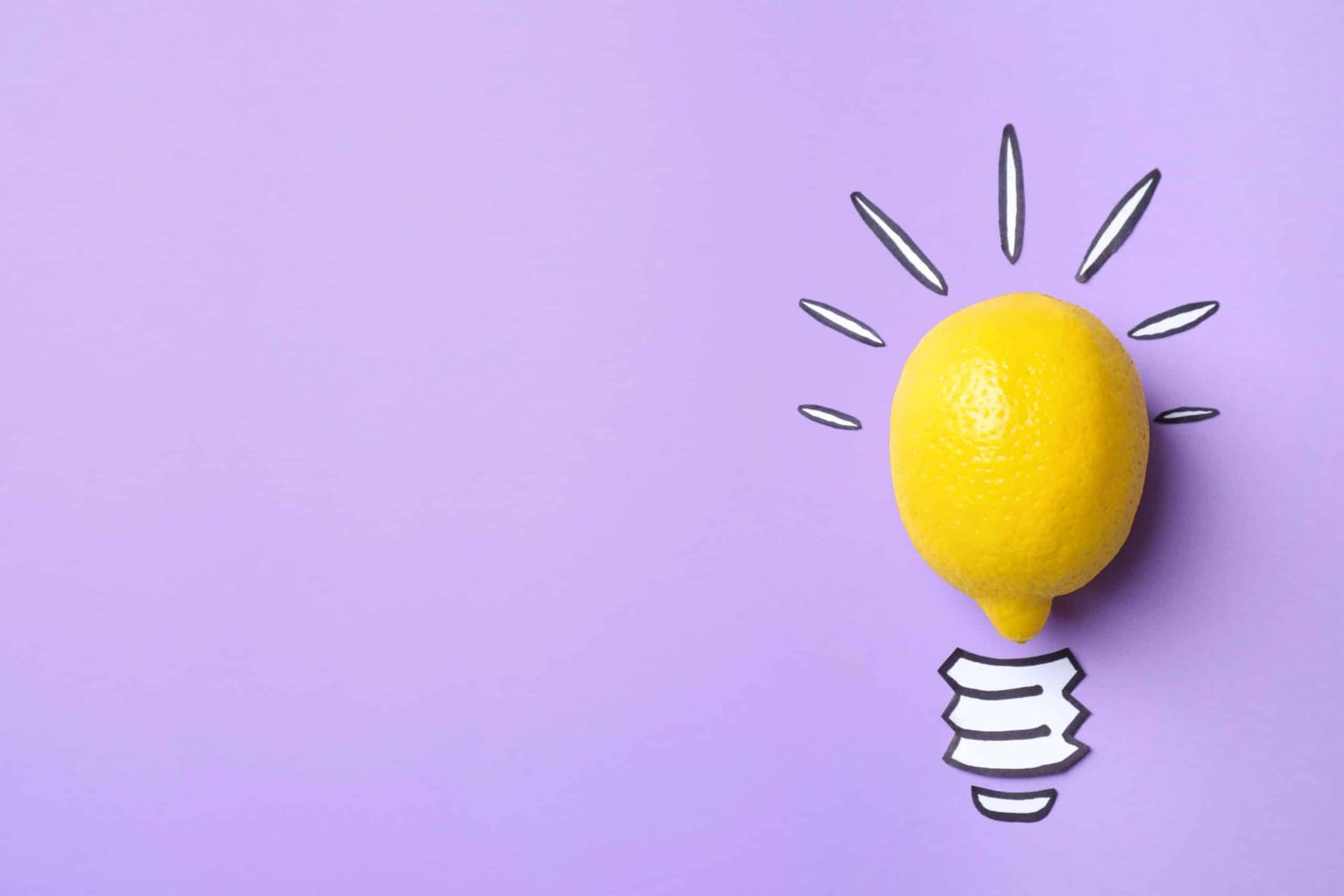 Composition With Lemon As Lamp Bulb And Space For Text On Violet Background, Top View. Creative Concept
