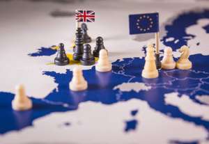 Chess Pieces Over An European Map. Brexit Concept