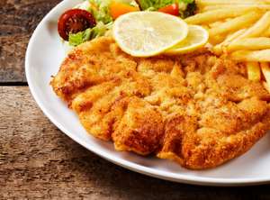 Schnitzel With French Fries Close Up