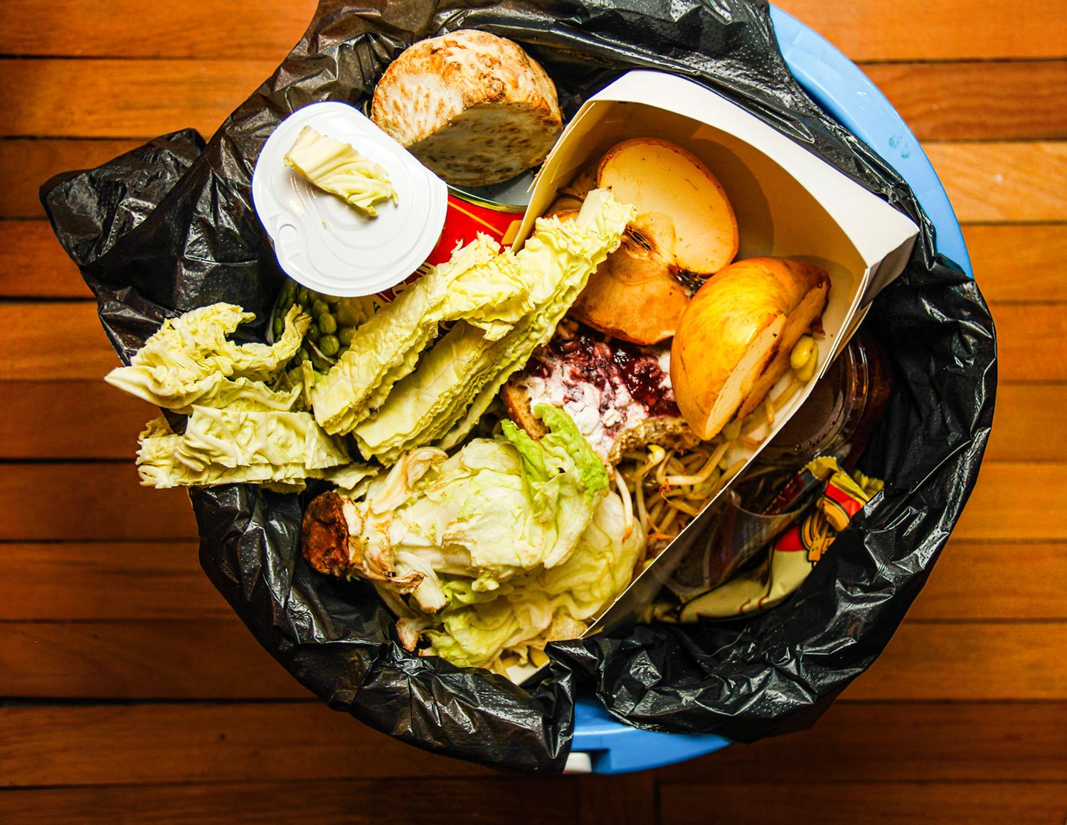 A Garbage Can With Unused Food. Food Waste As A Global Problem I