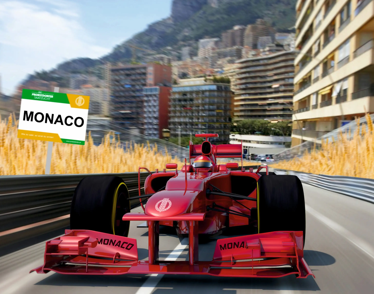 Roter Formel-1-Rennwagen fährt auf der Strecke in Monaco mit Stadtkulisse und einem Schild der Marke Probstdorfer Saatzucht.