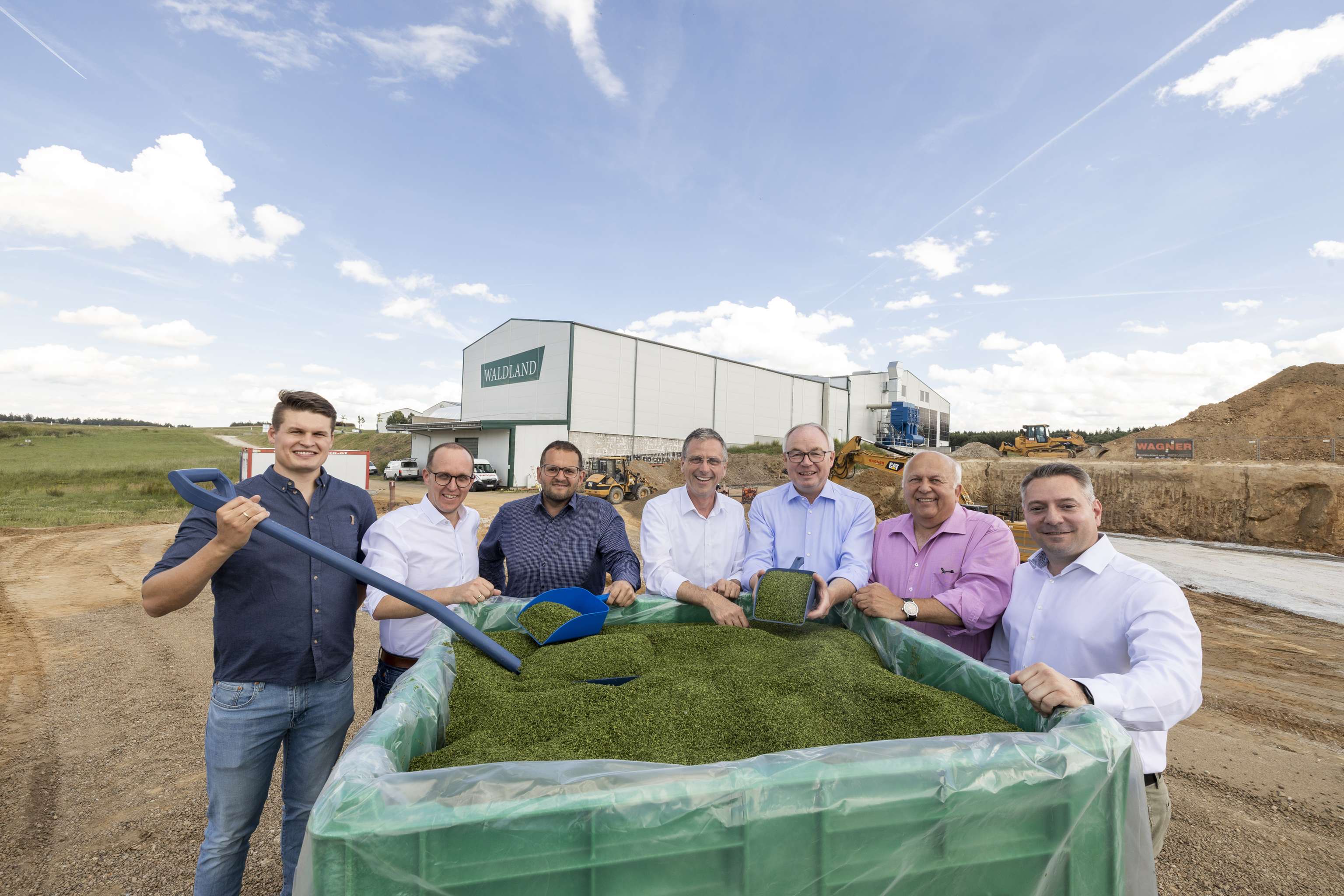 Gruppenfoto vor der Baustelle