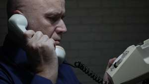 Image With A Businessman Making A Phone Call Late From Office