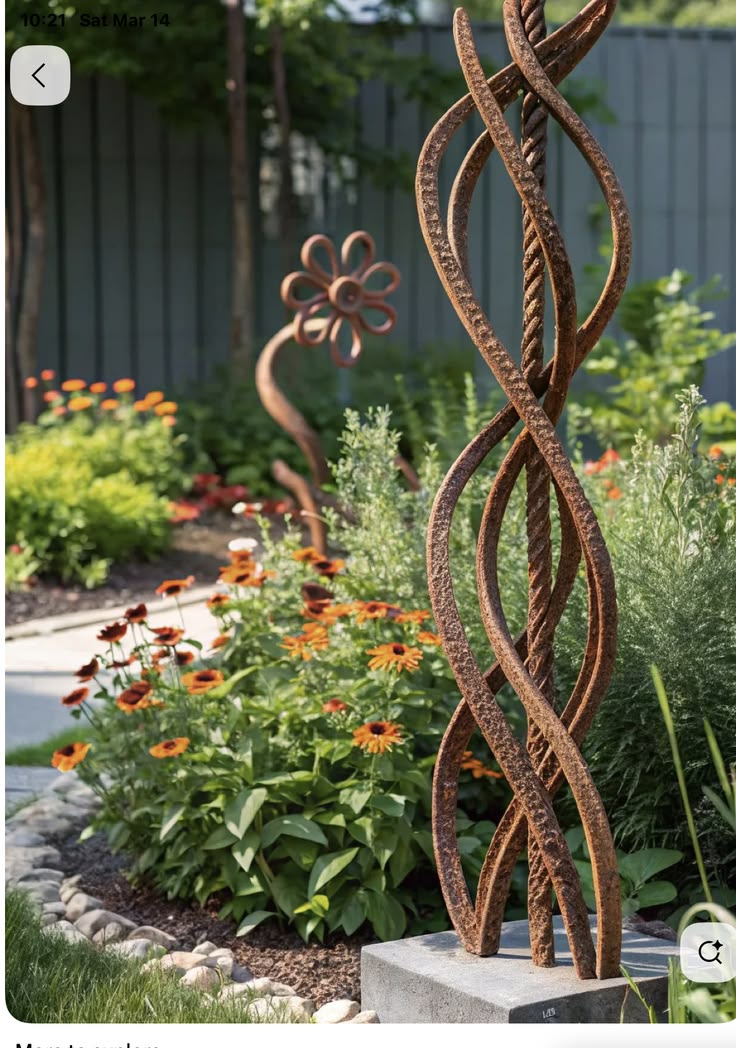 Bild von Anzeige: Blumen aus Betonstahl mit Kerzenhalter Schlosserei Kunst-Schmiede 