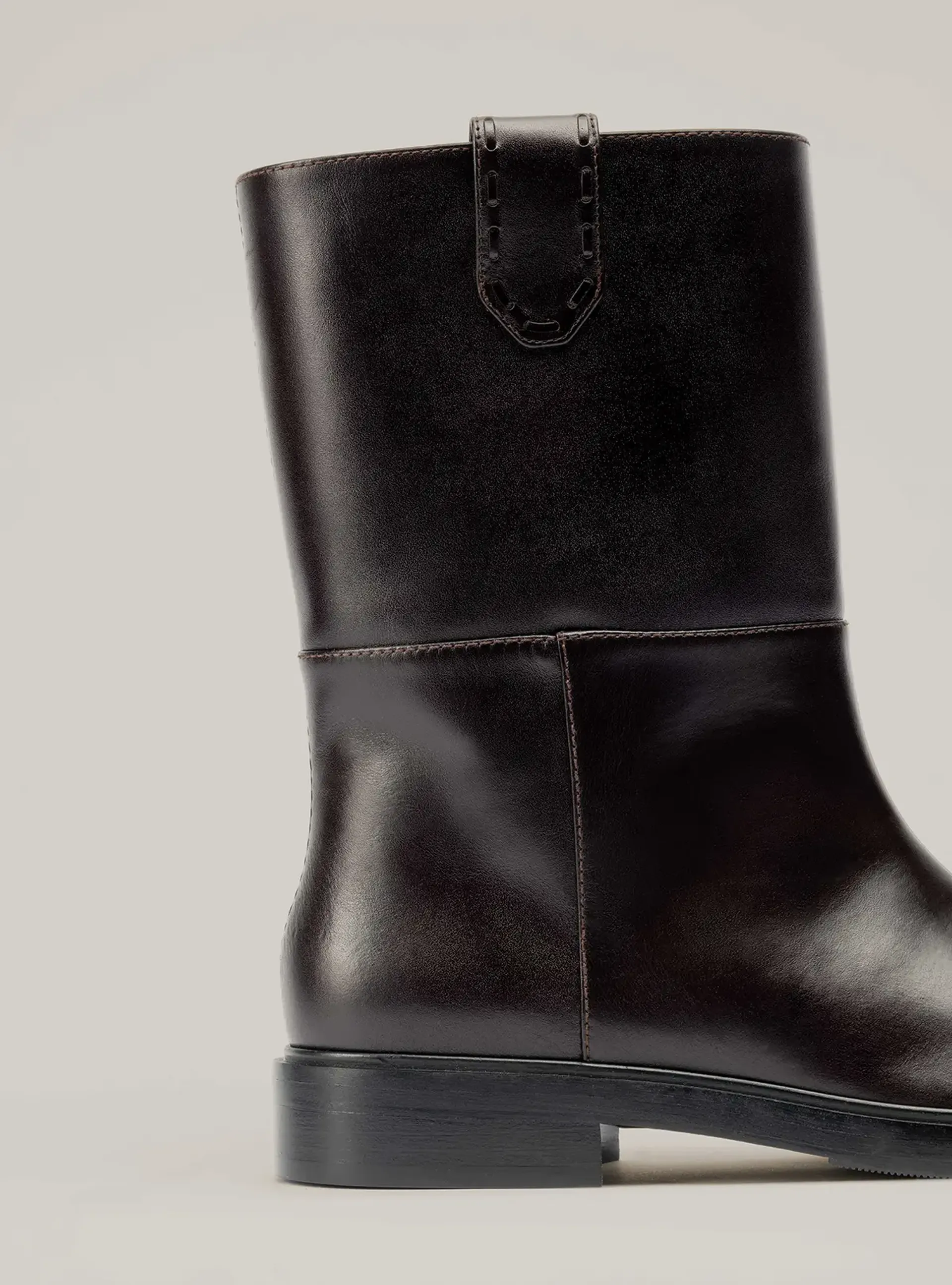 the city boot brown calf beige background