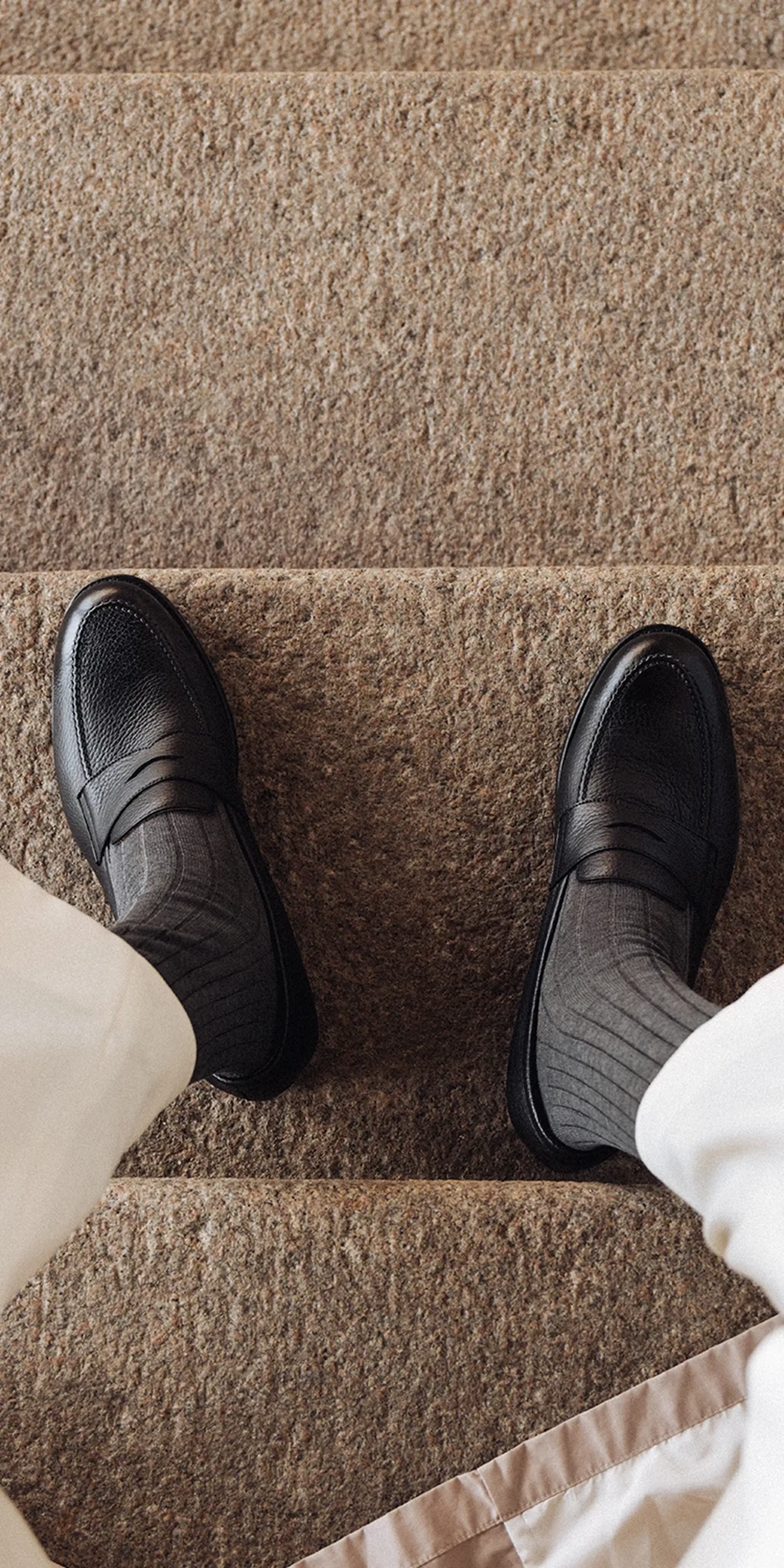 The Penny Loafer in black grain mobile