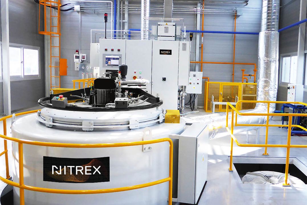 Industrial nitriding furnace , labeled "Nitrex," Aichelin
