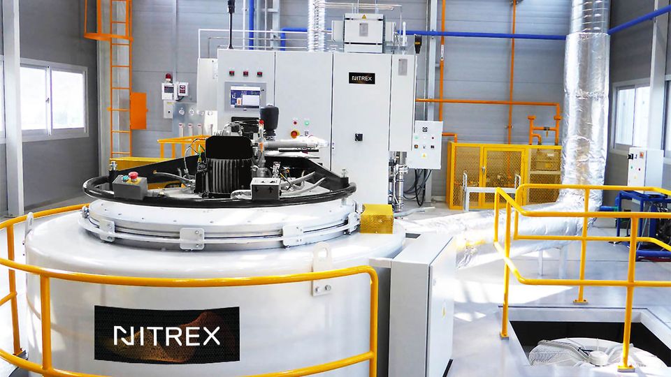 Industrial nitriding furnace , labeled "Nitrex," Aichelin