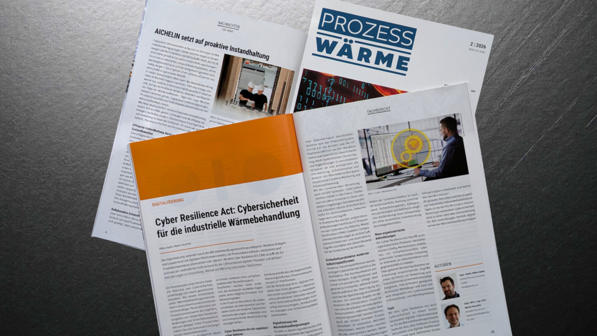 Open magazines with articles on industrial cybersecurity and maintenance strategies, featuring images and diagrams, spread on a dark surface.