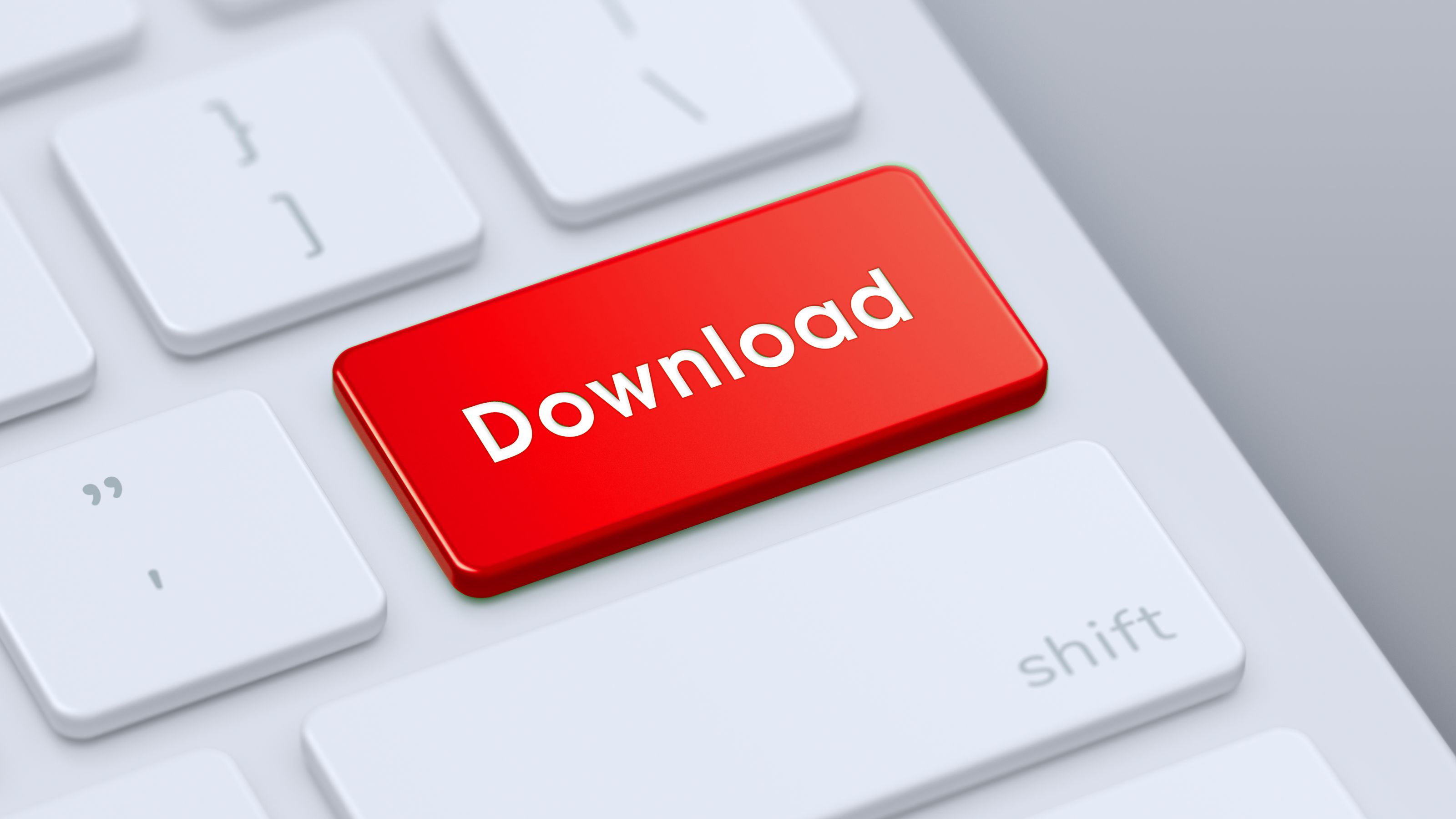 Nahaufnahme einer Computertastatur mit Download Button