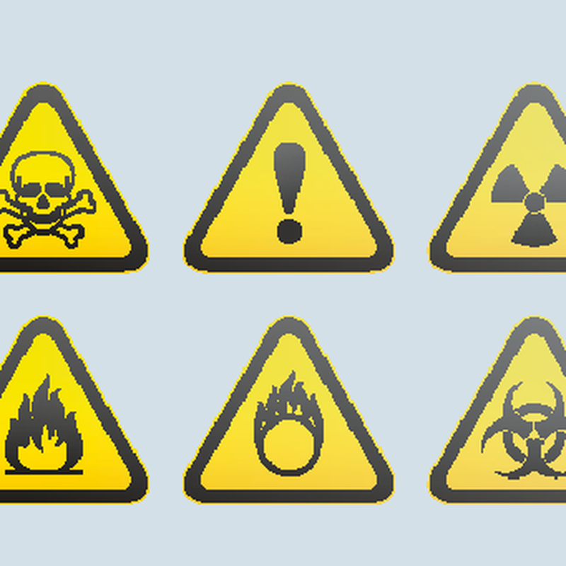 Six yellow triangle warning signs: skull, exclamation mark, radiation, fire, flammable symbol, biohazard.