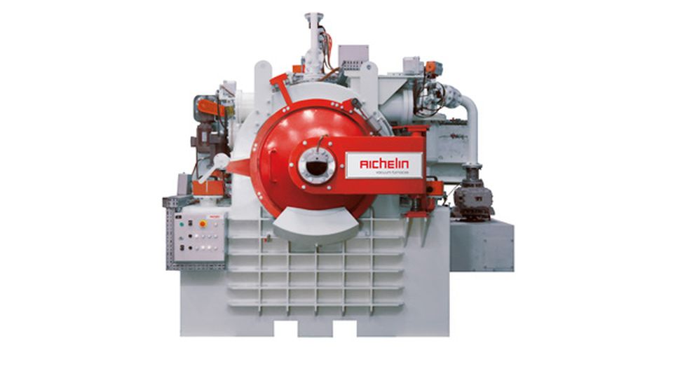 Industrial machinery with a red circular component and various pipes and controls, labeled "Aichelin," on a white background.