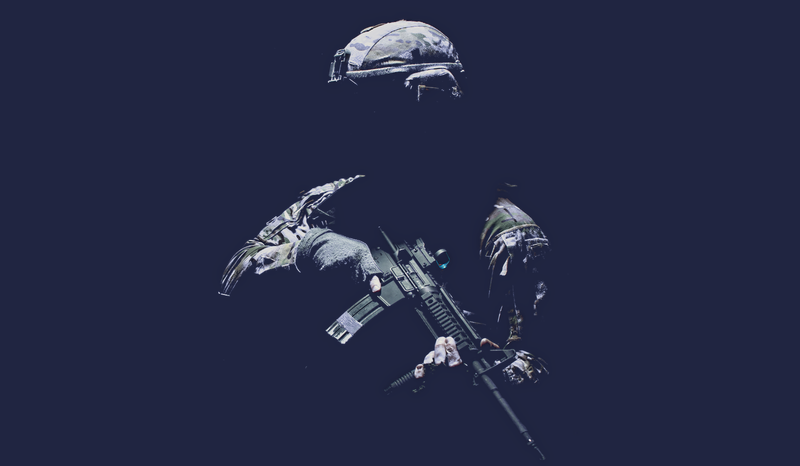 A soldier in camouflage gear and helmet holds a rifle against a dark background, with minimal lighting highlighting the uniform and weapon.