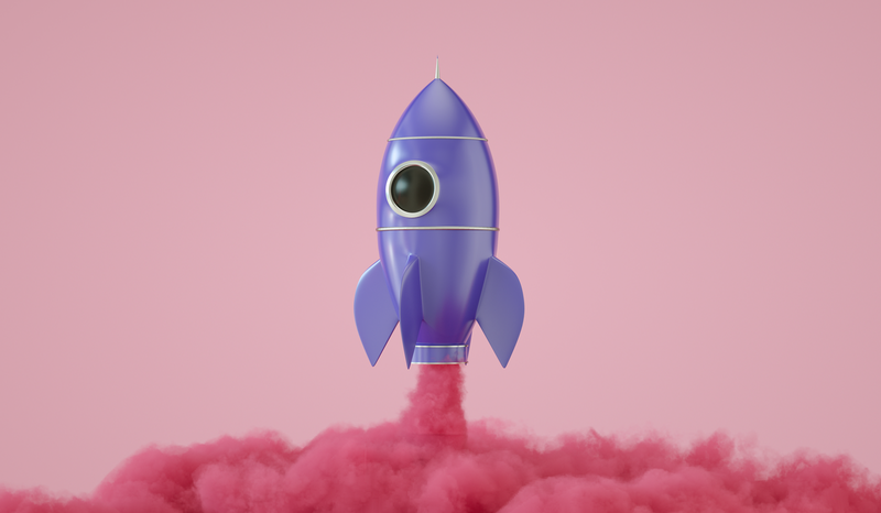 A blue cartoon rocket launching, surrounded by pink smoke, against a pink background.