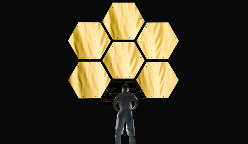 James Webb Space Telescope mirrors and technician stood in front