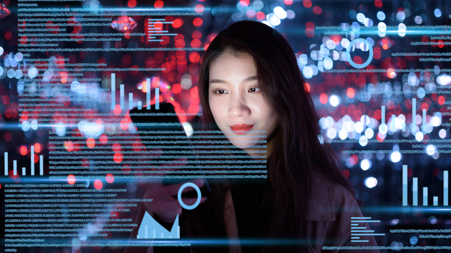 Woman interacting with virtual data visualizations, including graphs and code, against a background of red and blue lights.