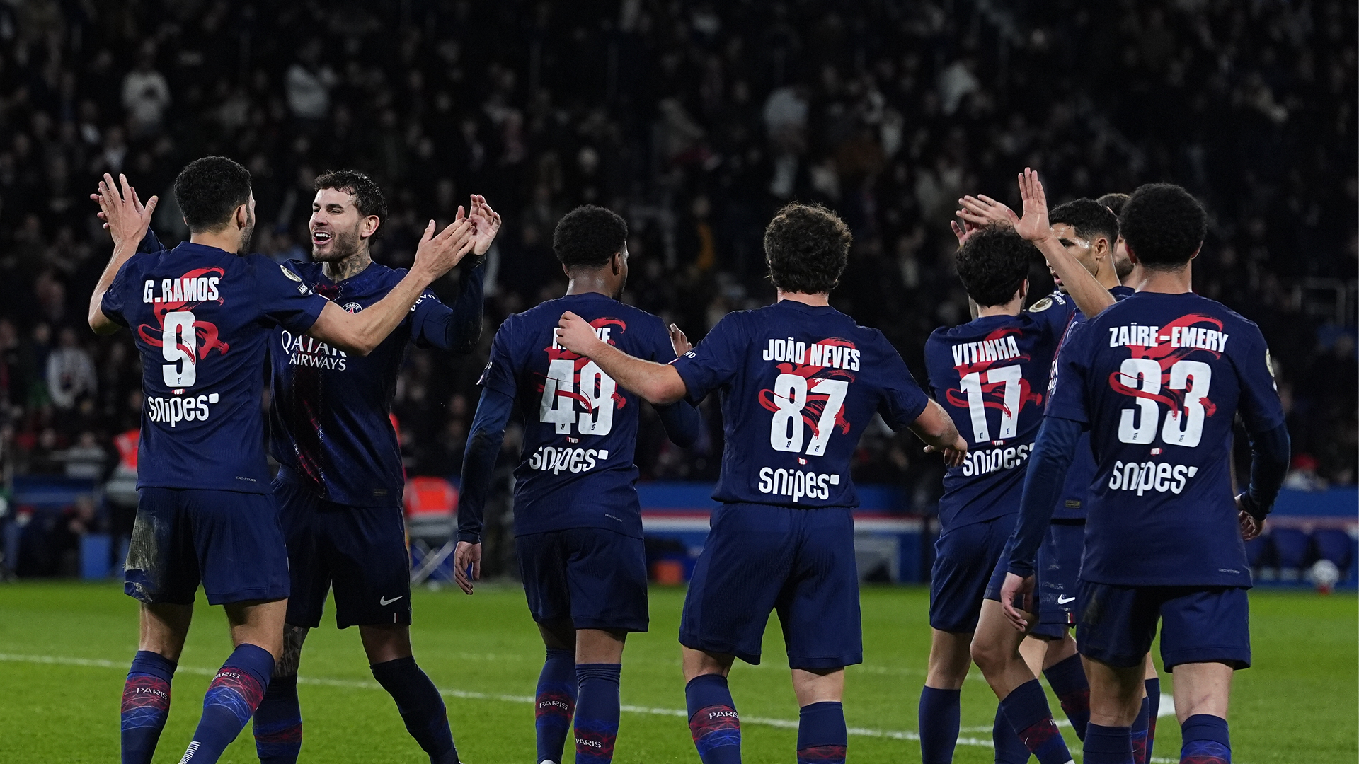 PSG players celebrate a goal in the 3-0 win over Metz wearing their 2026 Lunar New Year collab shirt