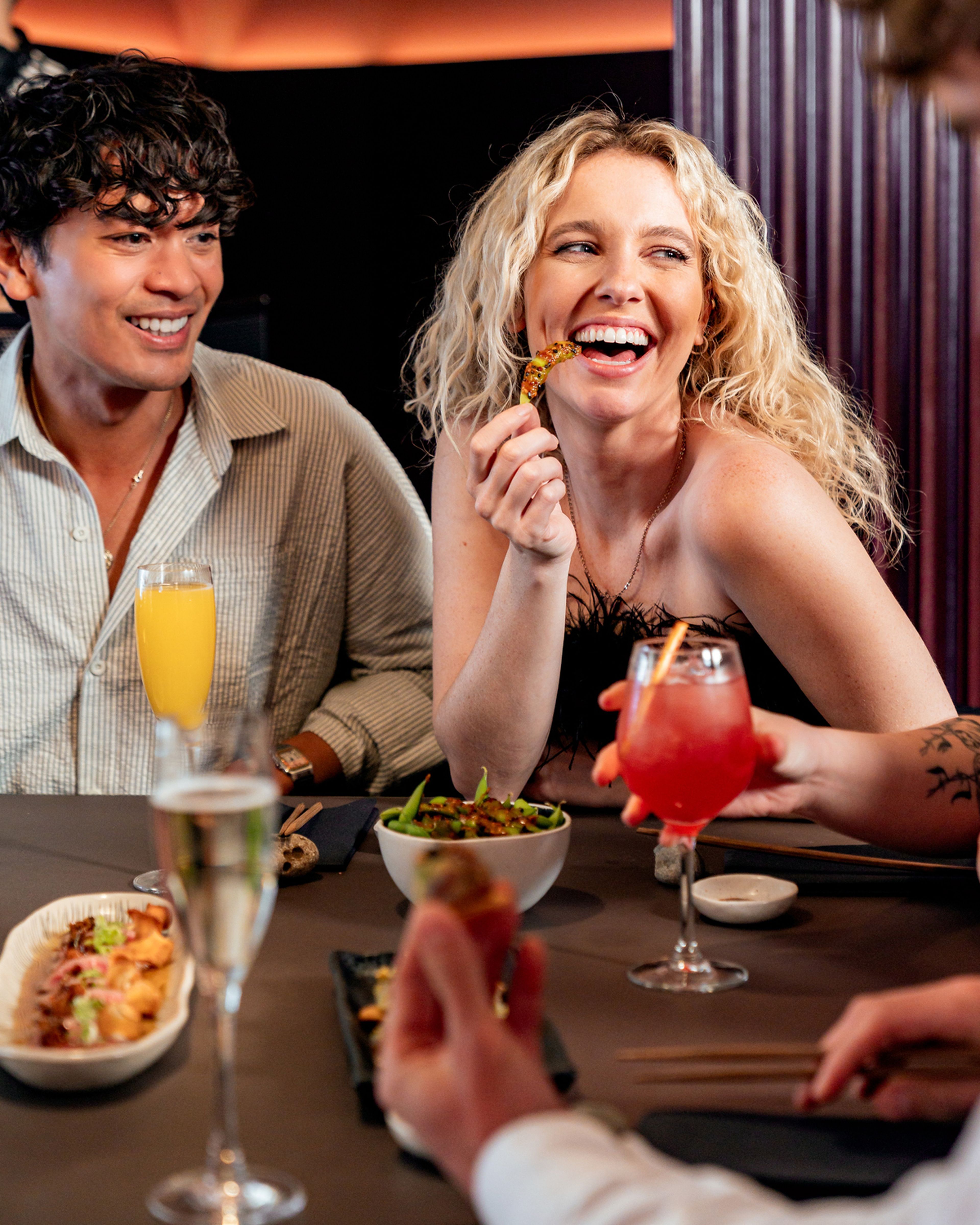 Young bunch of people enjoying a bottomless brunch in Shoreditch