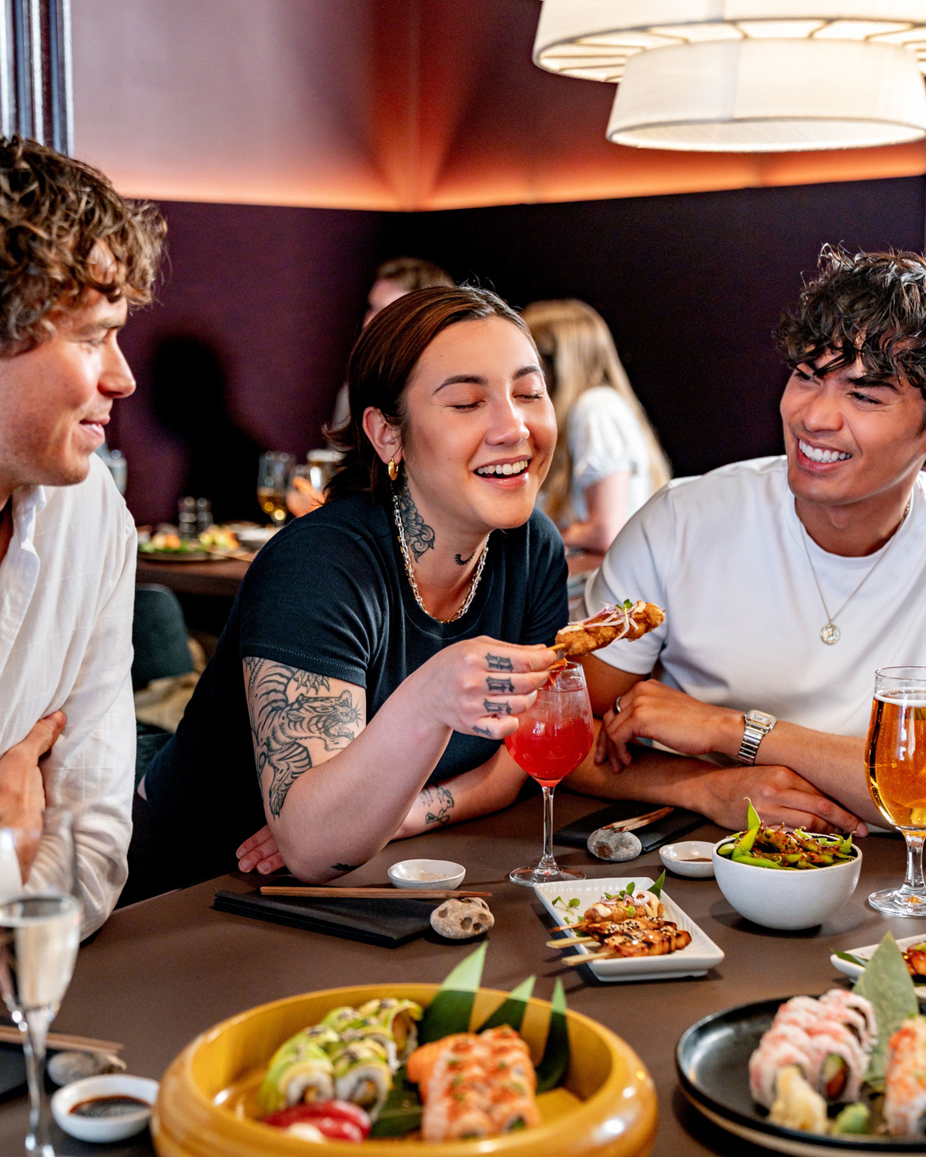 Young bunch of people enjoying a bottomless brunch in Shoreditch