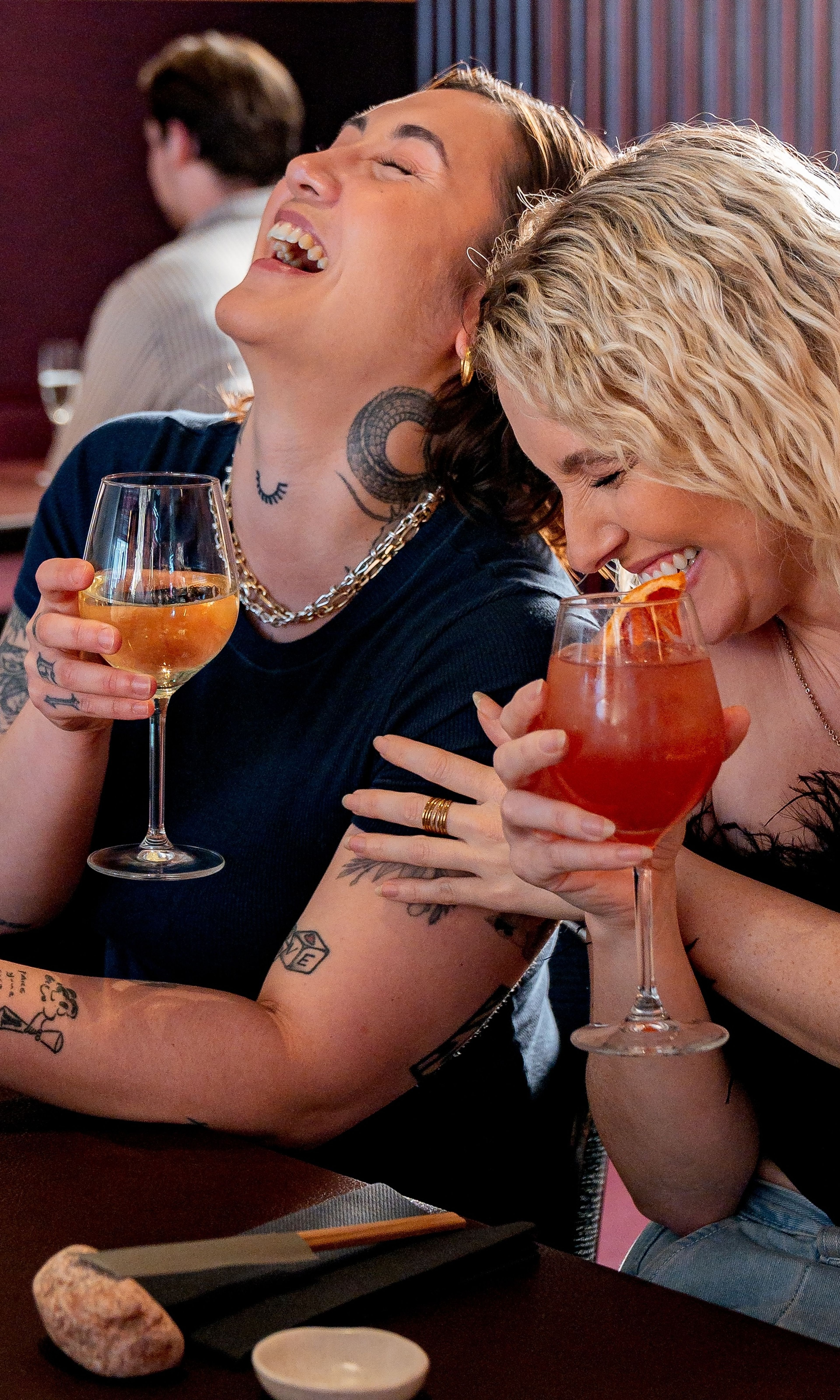 Group of young people enjoying bottomless drinks and a Japanese brunch