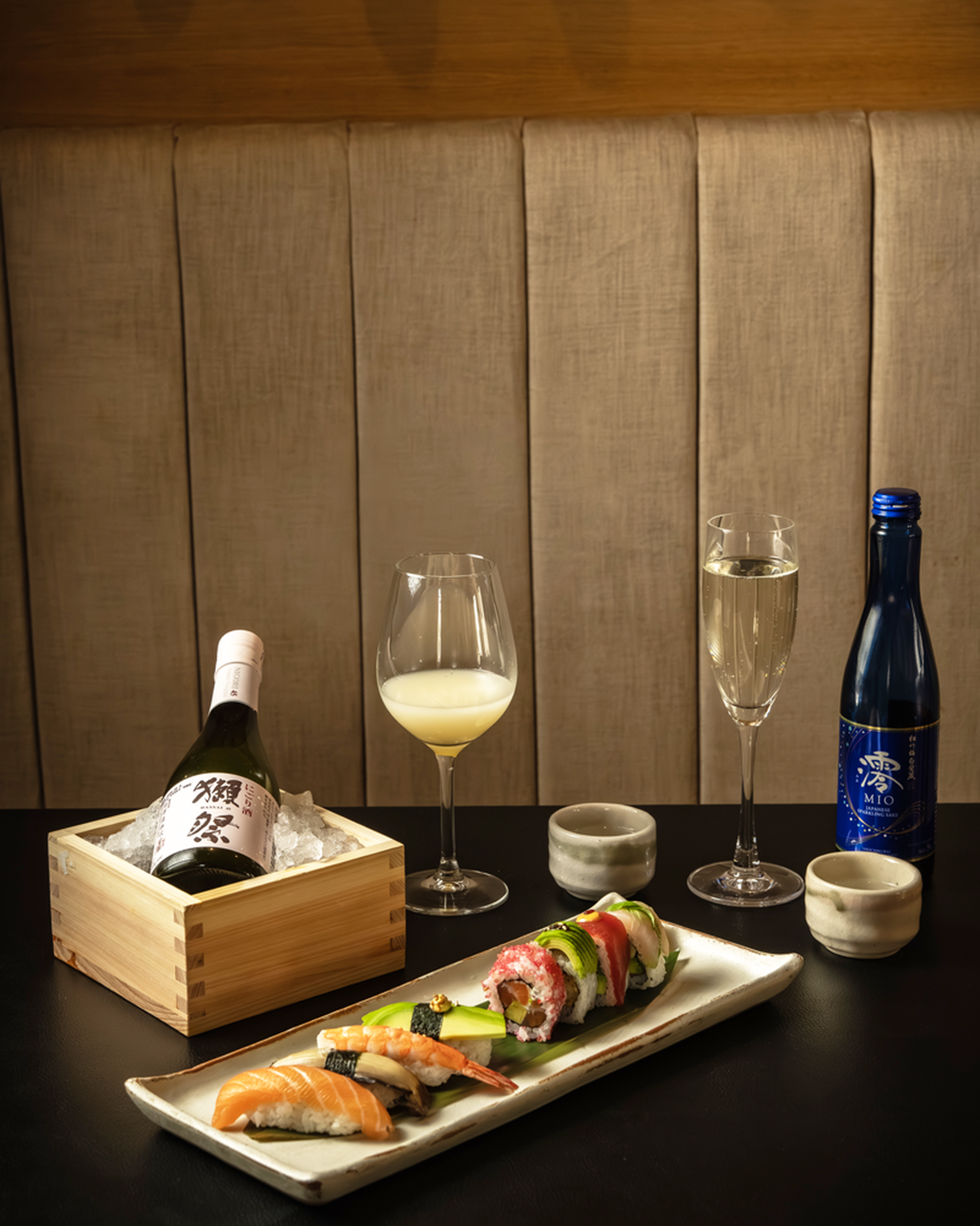 Sake and sushi on a table