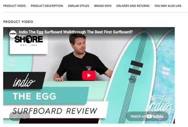 A person reviews a turquoise surfboard, labeled "Indio The Egg Surfboard Walkthrough," on a YouTube video thumbnail.