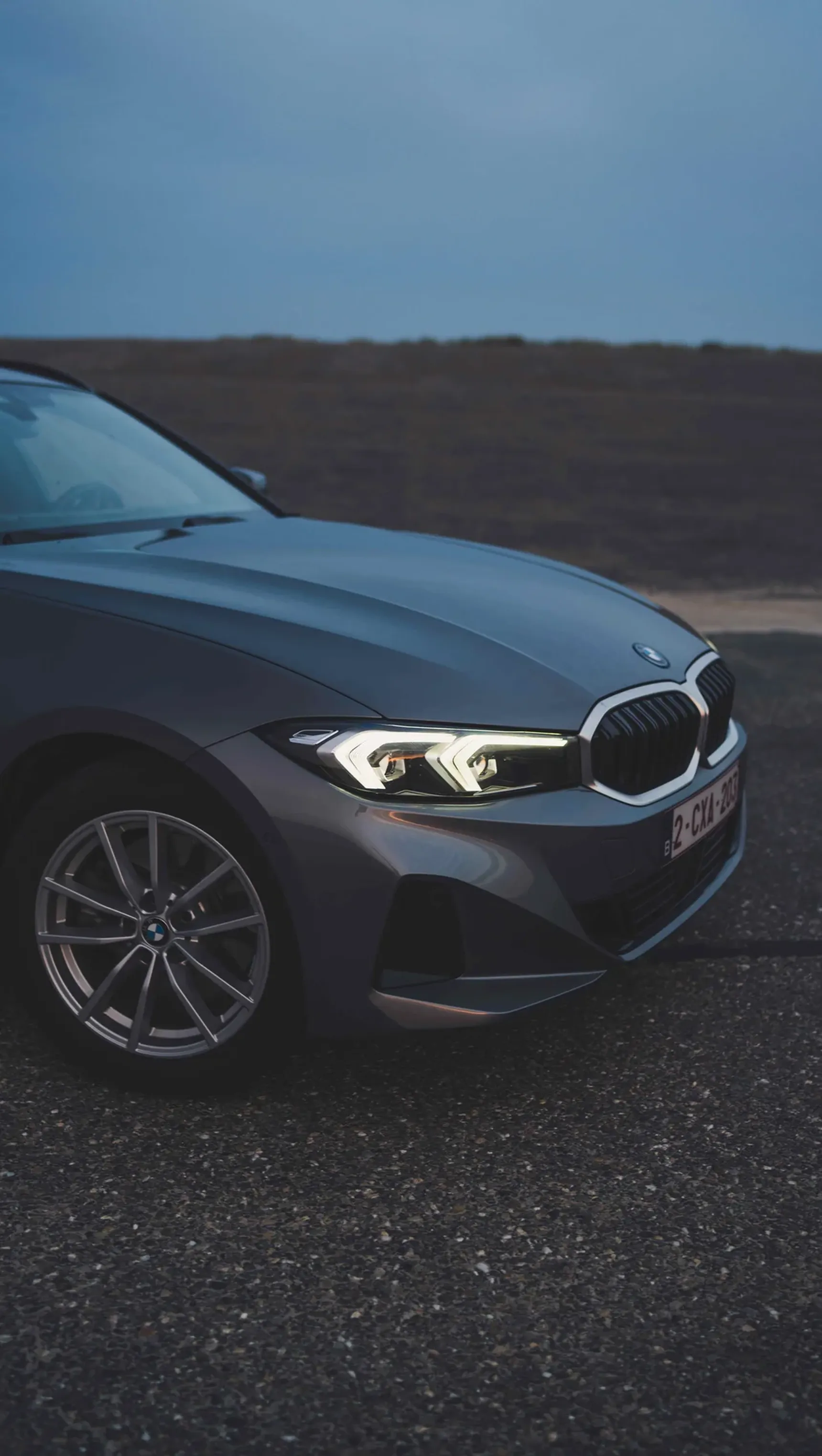 2024 BMW 320e Touring front grille iphone background headlights