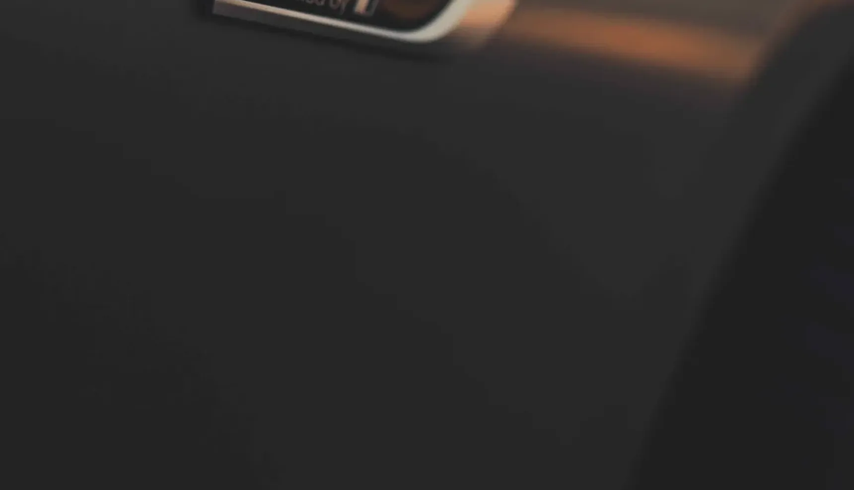 2024 BMW 320e Touring badge iphone background