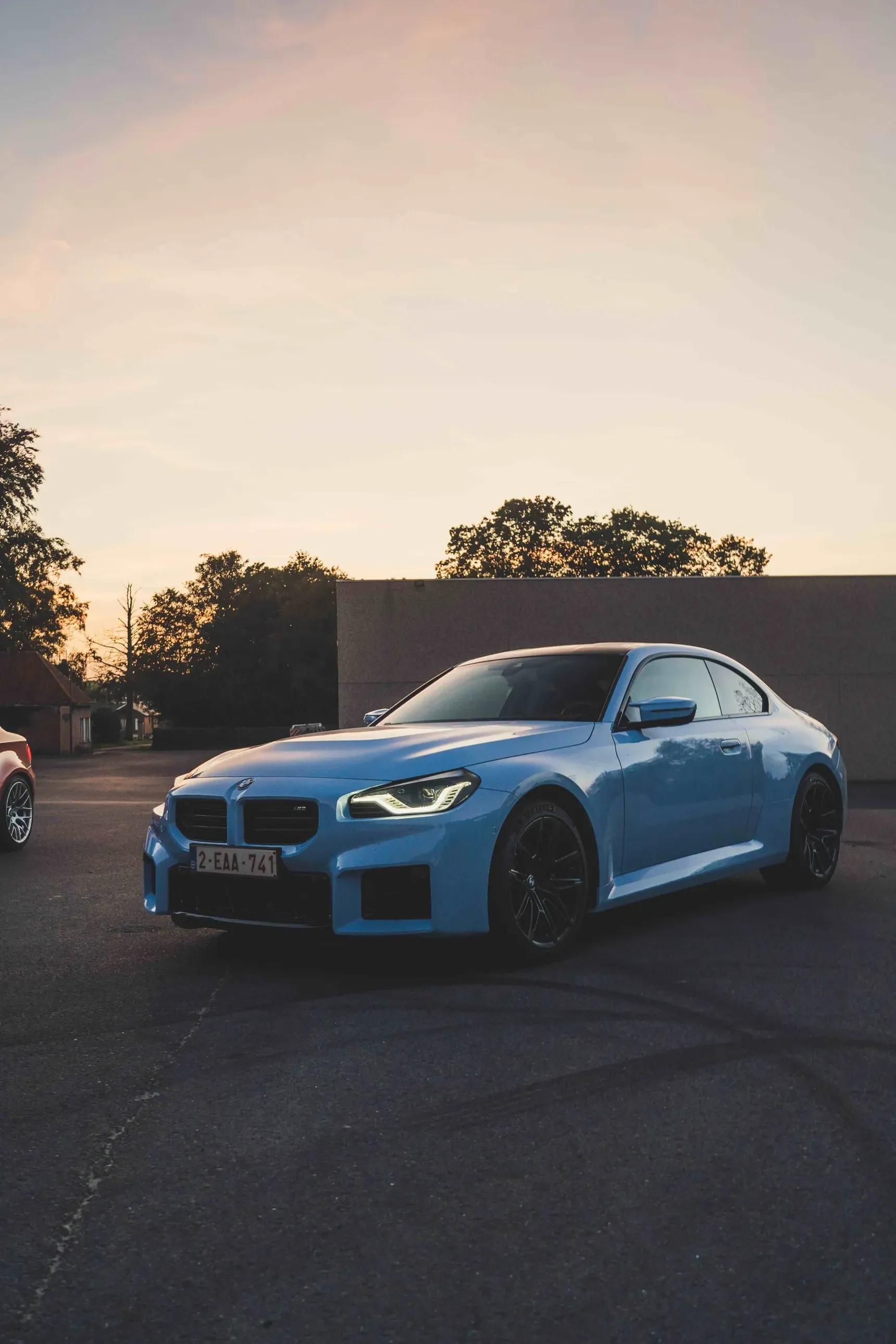 2024 BMW M2 manual iphone background sunset front