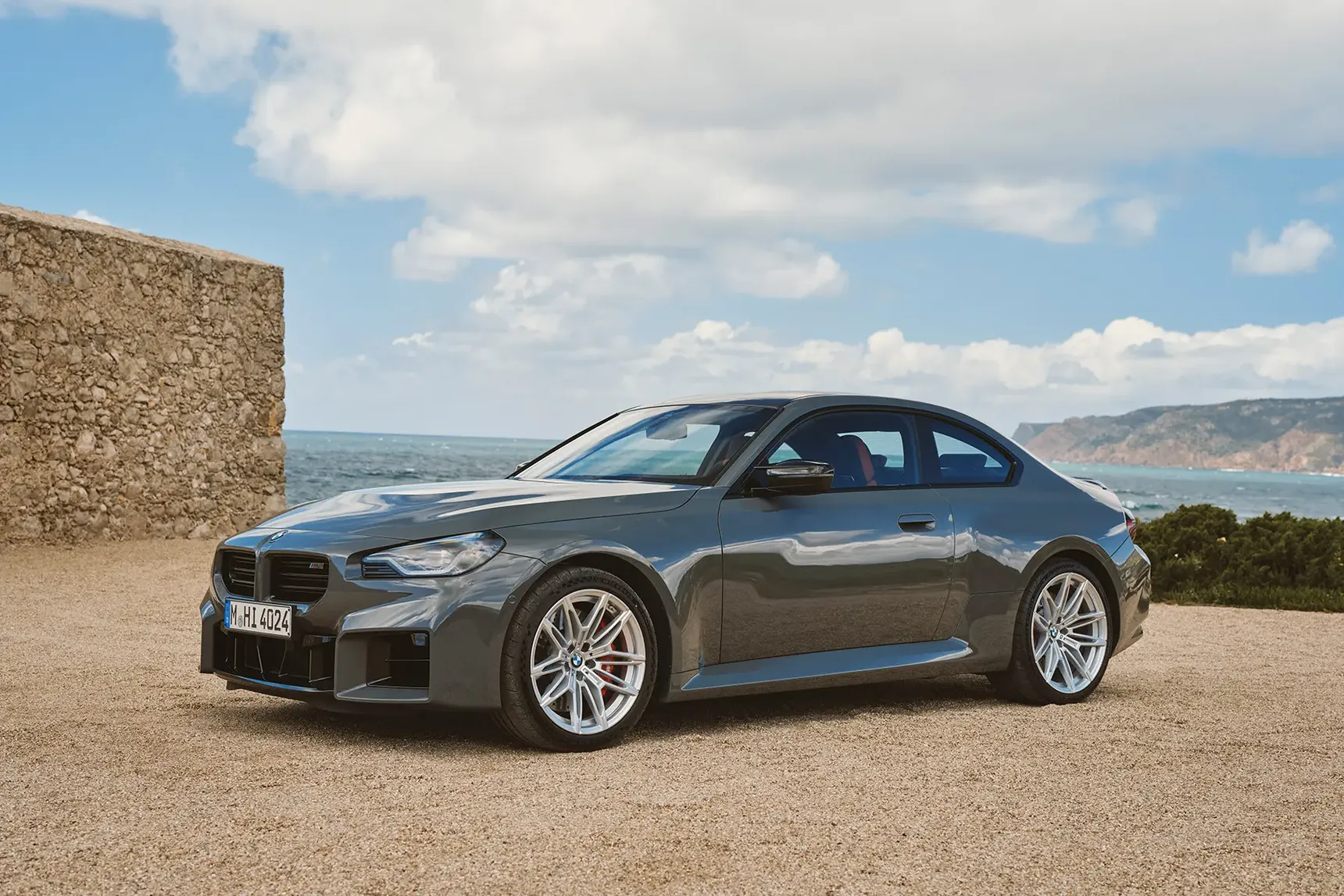 2025-BMW-M2-Coupé-Front-Shot-Portugal-Wallpaper-HD